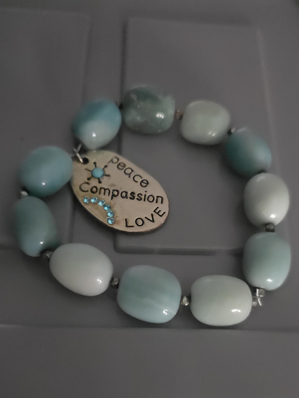 Source Unknown Aqua and Cream Beaded Stretch Bracelet with Inspiring Charm